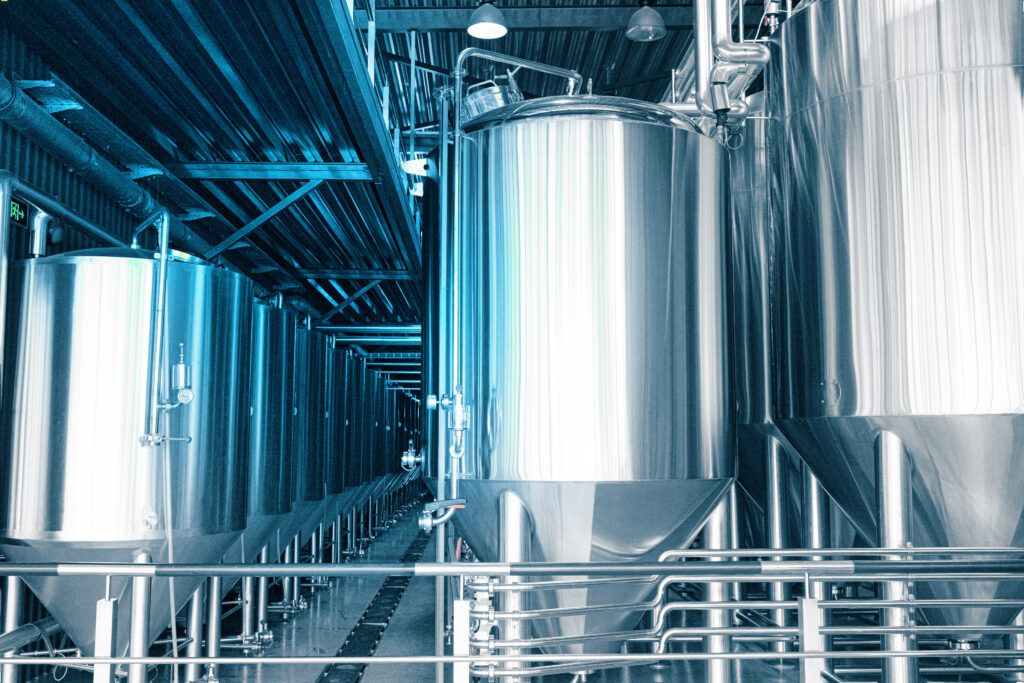 Large,Reservoirs,,Tanks,And,Pipes,With,Manometers,In,Private,Microbrewery.